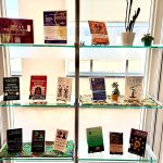 The library's front window with a truth and reconciliation book display.